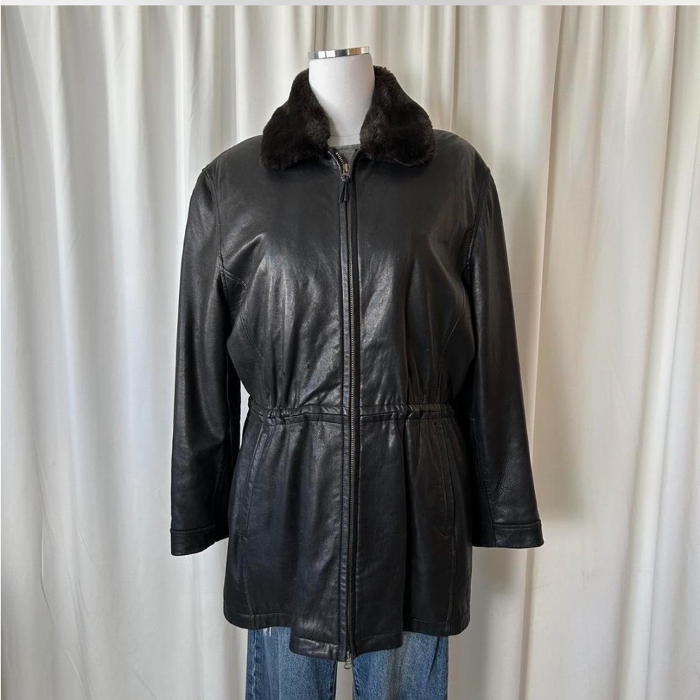 Vintage Couture women’s black leather jacket with faux fur collar.